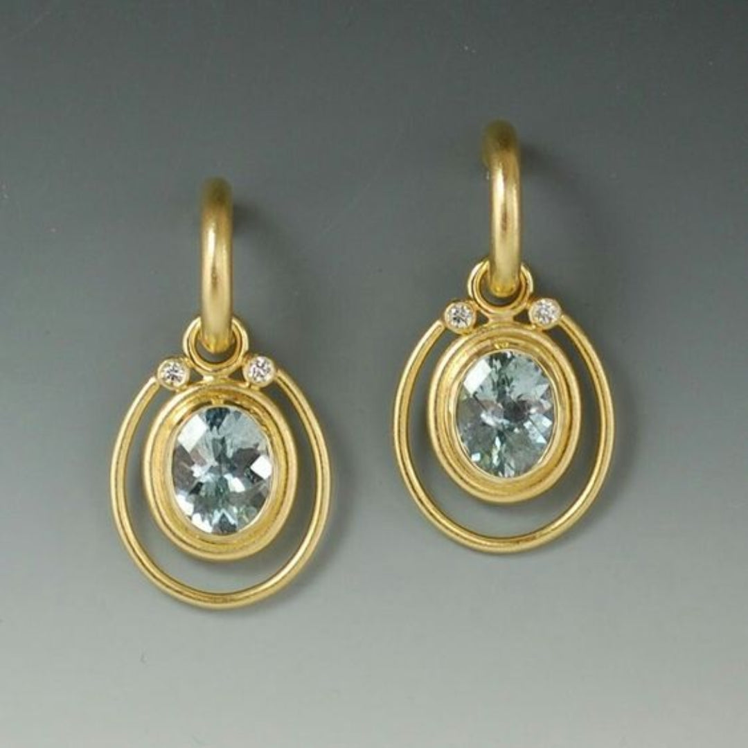 Vintage Goldohrringe mit hellblauem Kristall